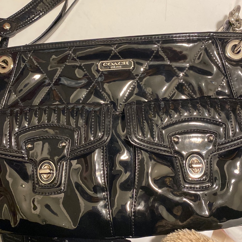 It a Coach bag please help me get rid of it thank you take it off my hand lol